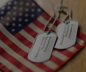 image of dog tags and american flag for veterans day